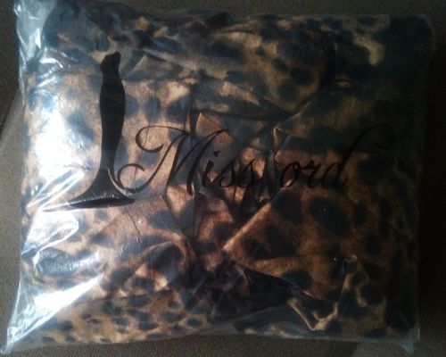 Customer photo review of Leopard High Neck Long Sleeve Jumpsuit