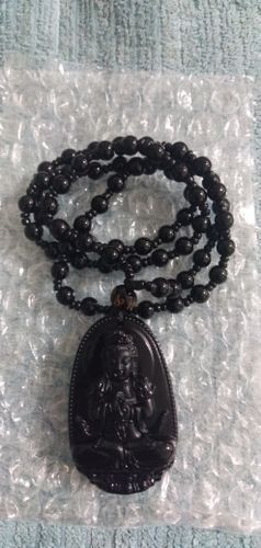 Customer photo review of Natural Obsidian Hand Carved Buddha Amulet Pendant Necklace