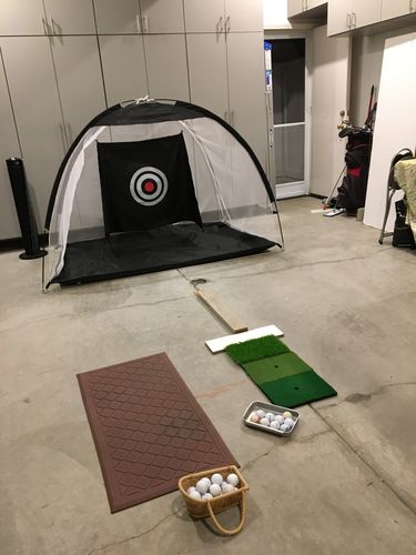 Customer photo review of Golf Practice Driving Net for Indoors and Outdoors | Tri-Turf Hitting Mat