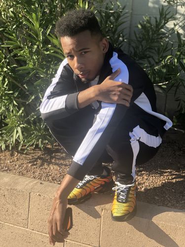 Customer photo review of Outside Solid One Stripe Track Pants (Black - White)