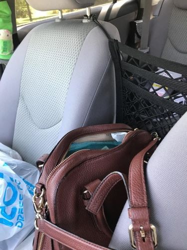 Customer photo review of 【50% OFF】Universal Seat Organizer & Barricade For Vehicles