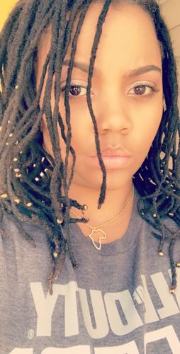 Customer photo review of MotherLand Africa Outline Necklace