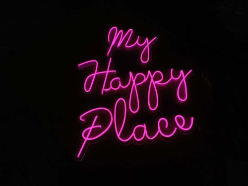 Customer photo review of 'This Is Our Happy Place' Neon Sign