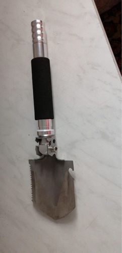 Customer photo review of Multi-Functional Military Tactical Folding Shovel Gardening Tool