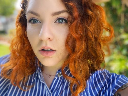 Customer photo review of Miss Mouse Necklace - Rose Gold