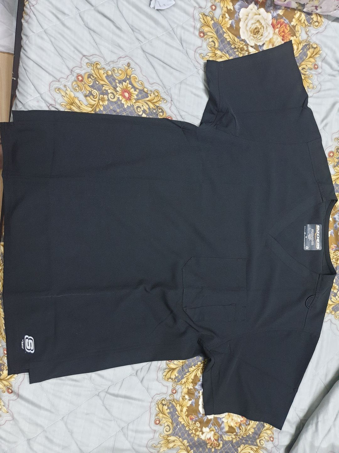 Customer photo review of بلوزة سكتشرز جيب واحد ~One pocket Scrub Top