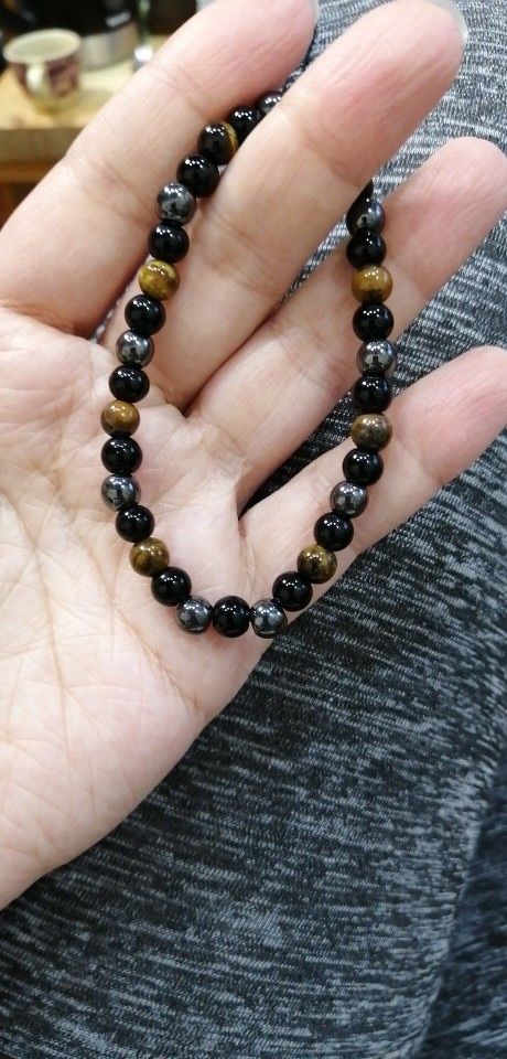 Customer photo review of Bracelet «Triple Protection» en oeil de tigre, obsidienne et Hématite