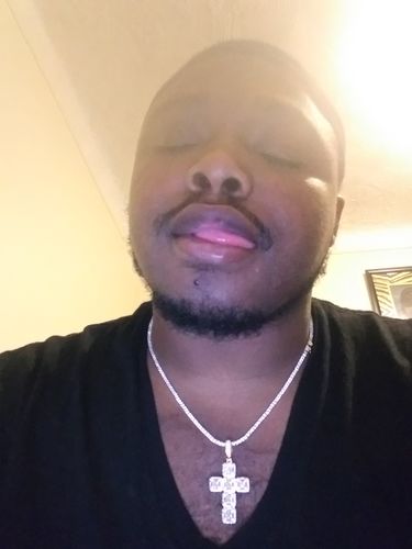 Customer photo review of 14K Gold Fancy Cuts Mini Cross