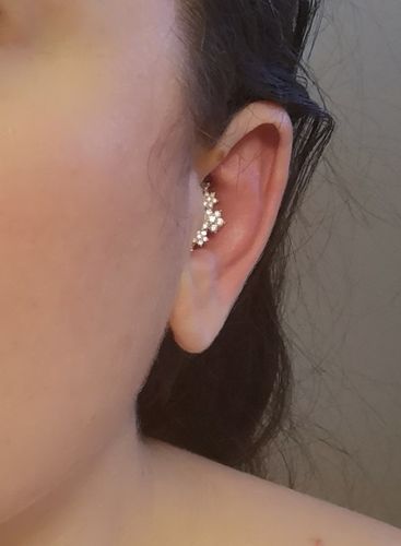Customer photo review of Flower Curve Top Cartilage Ring