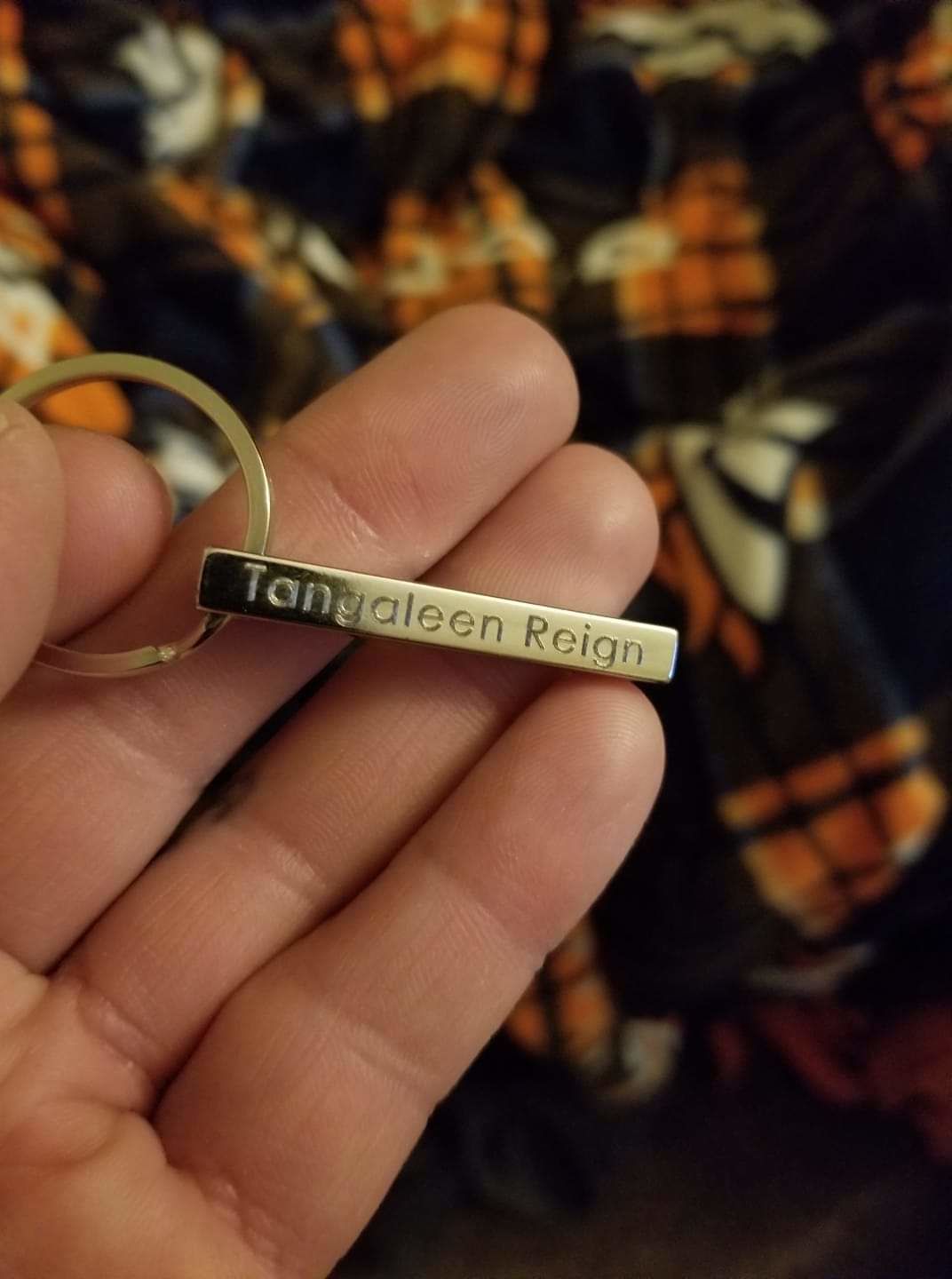 Customer photo review of Personalized 3D Bar Keychain, 4 Sided Metal Key fob