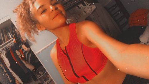 Customer photo review of Zip-Up Racer Back Surfer Bikini Top - Neon Pink