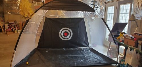 Customer photo review of Golf Practice Driving Net for Indoors and Outdoors | Tri-Turf Hitting Mat