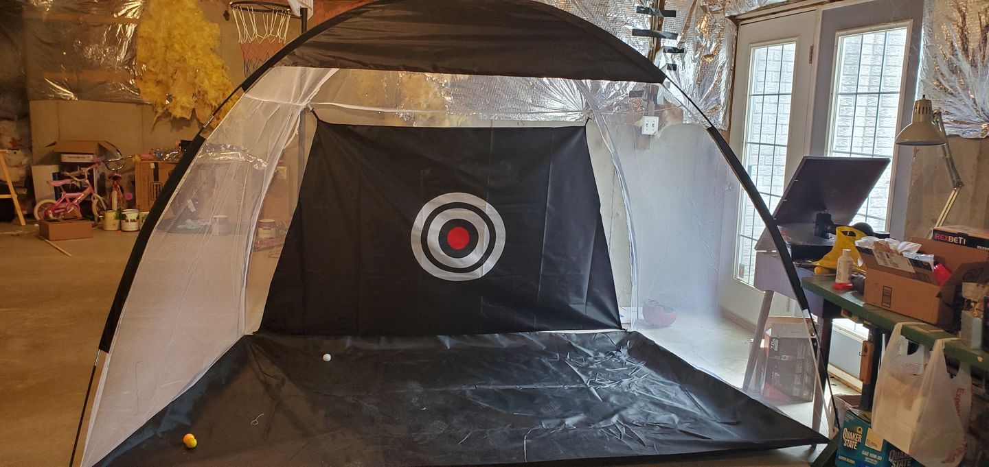 Customer photo review of Golf Practice Driving Net for Indoors and Outdoors | Tri-Turf Hitting Mat