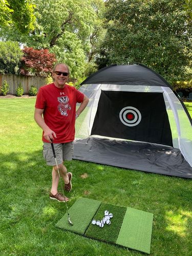 Customer photo review of Golf Practice Driving Net for Indoors and Outdoors | Tri-Turf Hitting Mat