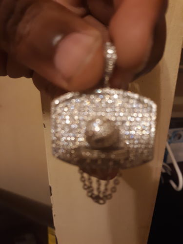 Customer photo review of Silver Mini Basketball Hoop Pendant With Chain