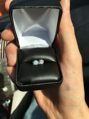 Customer photo review of VVS Moissanite Solitaire Stud Earrings