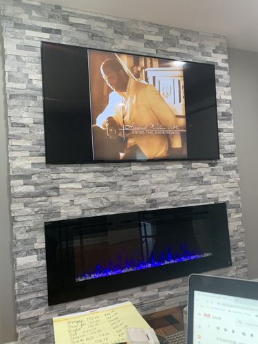 Customer photo review of Touchstone Sideline 60” Wall-Mount / Recessed Electric Fireplace