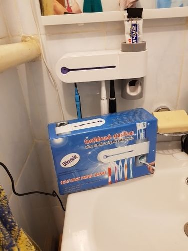 Customer photo review of GezondeGlimlach™ | UV tandenborstel houder