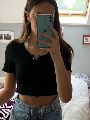 Customer photo review of Women's solid color short sleeve button top