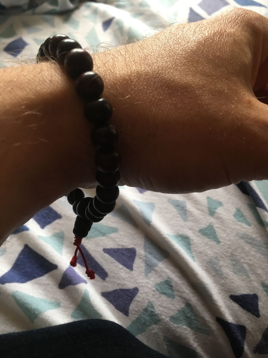 Customer photo review of Bracelet Tibétain | Bois de Santal Rouge | 8mm