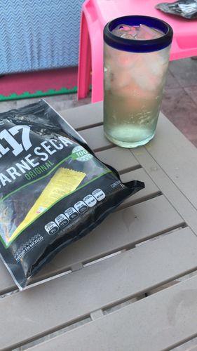 Reseña con foto de un cliente sobre Carne Seca Original