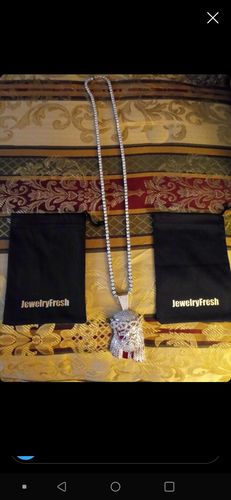 Customer photo review of Rhodium Simulated Diamond 3D Jesus Pendant