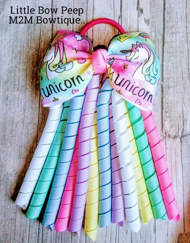 Helen M. review of Pastel Rainbow Unicorn Grosgrain Ribbon 2'' or 3'' image 1 out of 1
