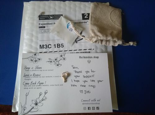 Customer photo review of Classic Pierced Nose Ring