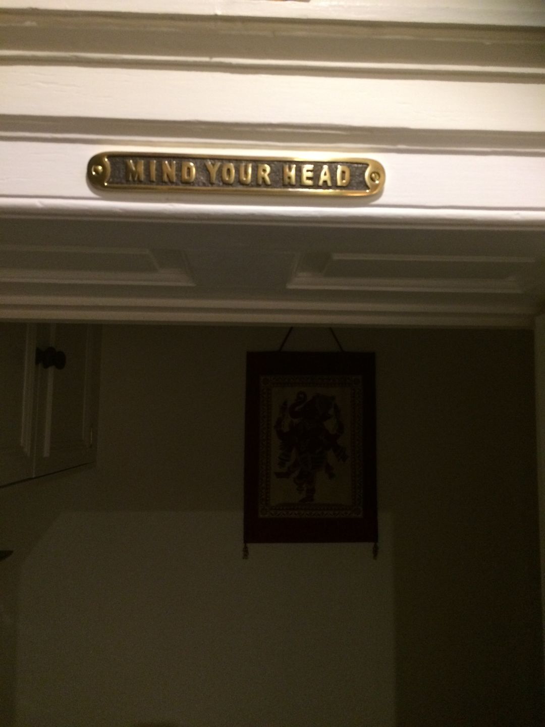 Customer photo review of Mind Your Head Sign · Brass ·