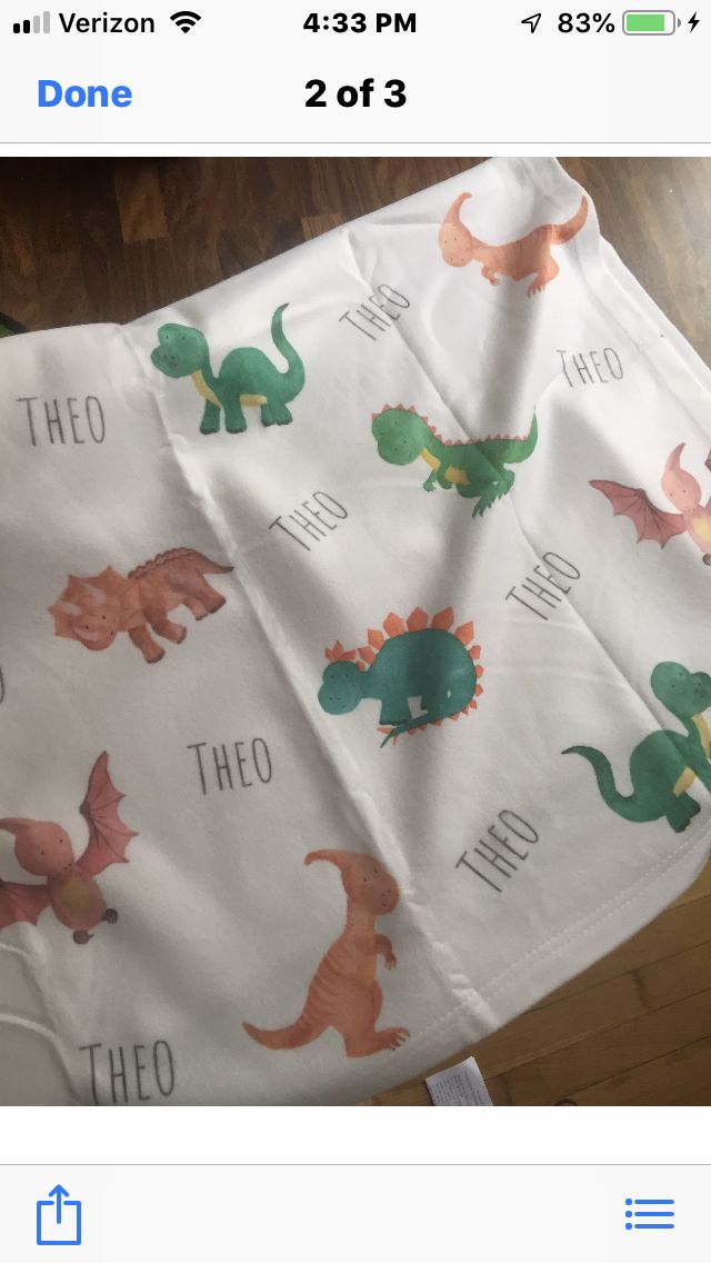 Customer photo review of Personalized Dinosaur Watercolor Print Baby Name Blanket