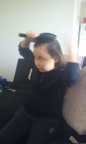 Customer photo review of Scream-Free Hair Brush™ Maxi