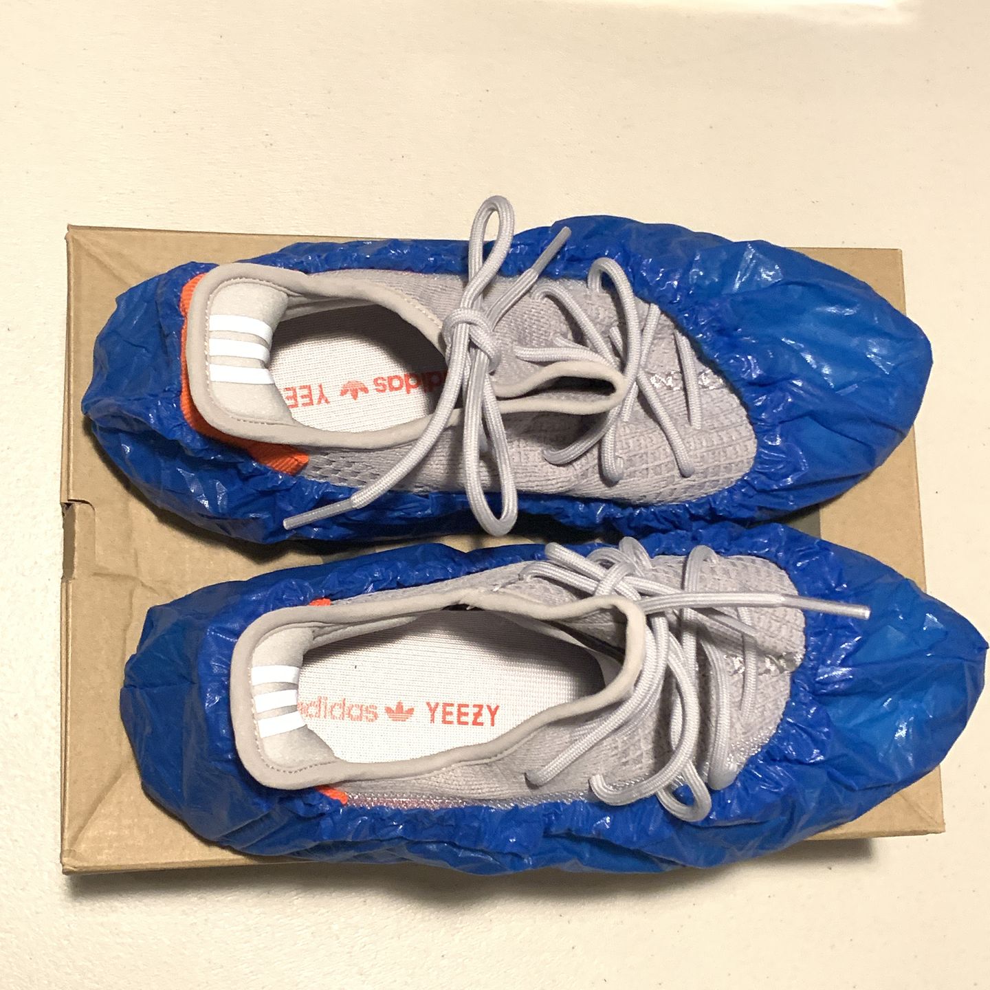 Customer photo review of Innovative Haus™ Premium Thick Waterproof Disposable Boot & Shoe Covers | 100-Pack Blue