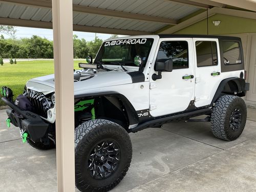 Customer photo review of Aluminum Door Grab Handle Inserts Cover for 11-18 Jeep Wrangler JK/ JKU, 4 Door