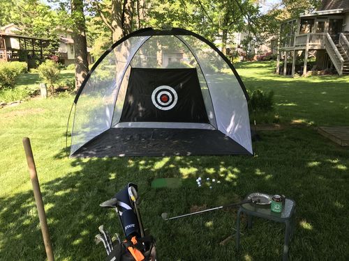 Customer photo review of Golf Practice Driving Net for Indoors and Outdoors | Tri-Turf Hitting Mat