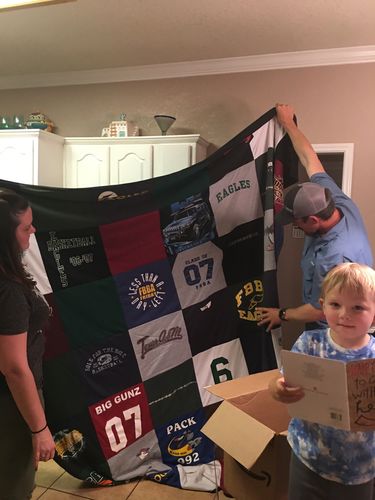 T-shirt quilt with nascar, sports themes by KAY from TX