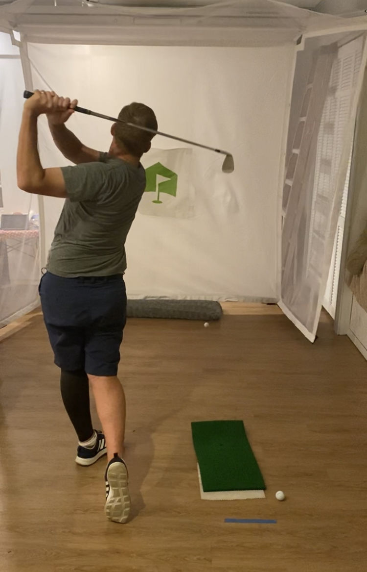 Customer photo review of HomeCourse Pro Retractable Golf Simulator Screen