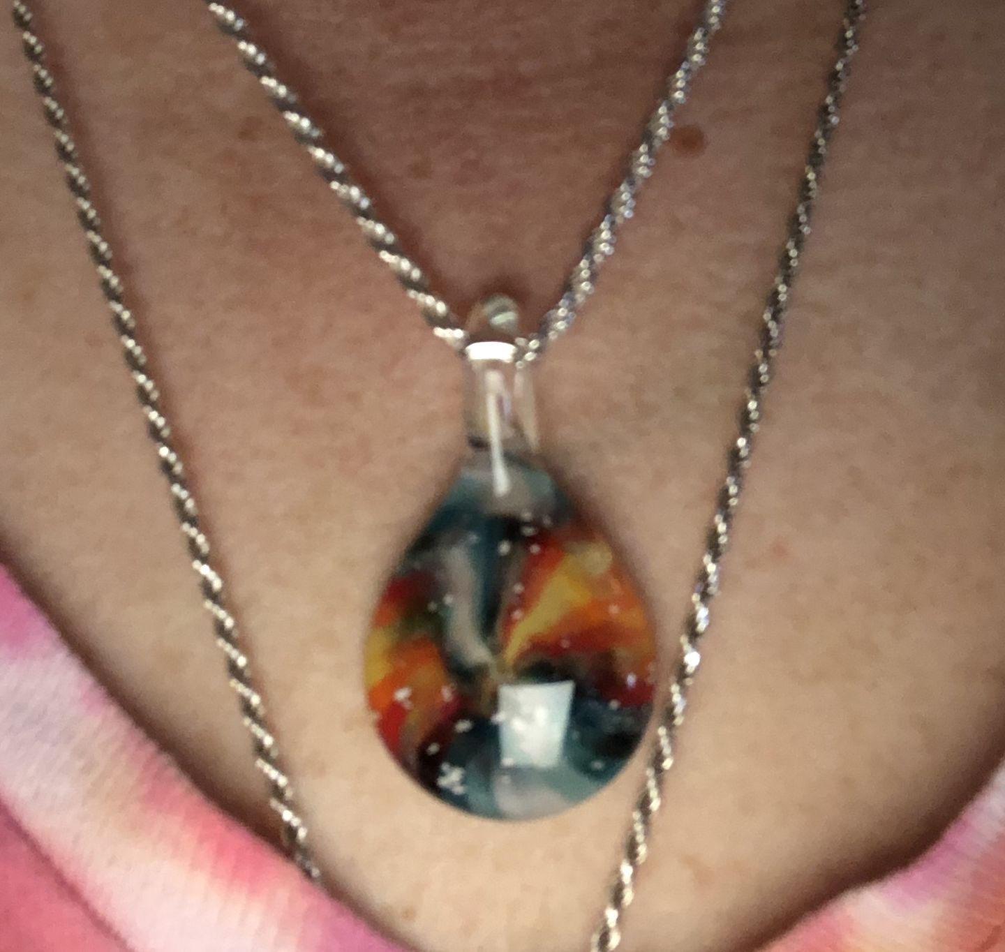 Customer photo review of Tie Dye Pendant with Infused Cremation Ashes