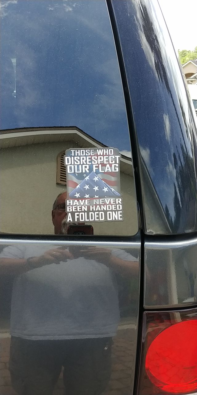 Customer photo review of Those Who Disrespect Our Flag Have Never Been Handed A Folded One 4" Decal