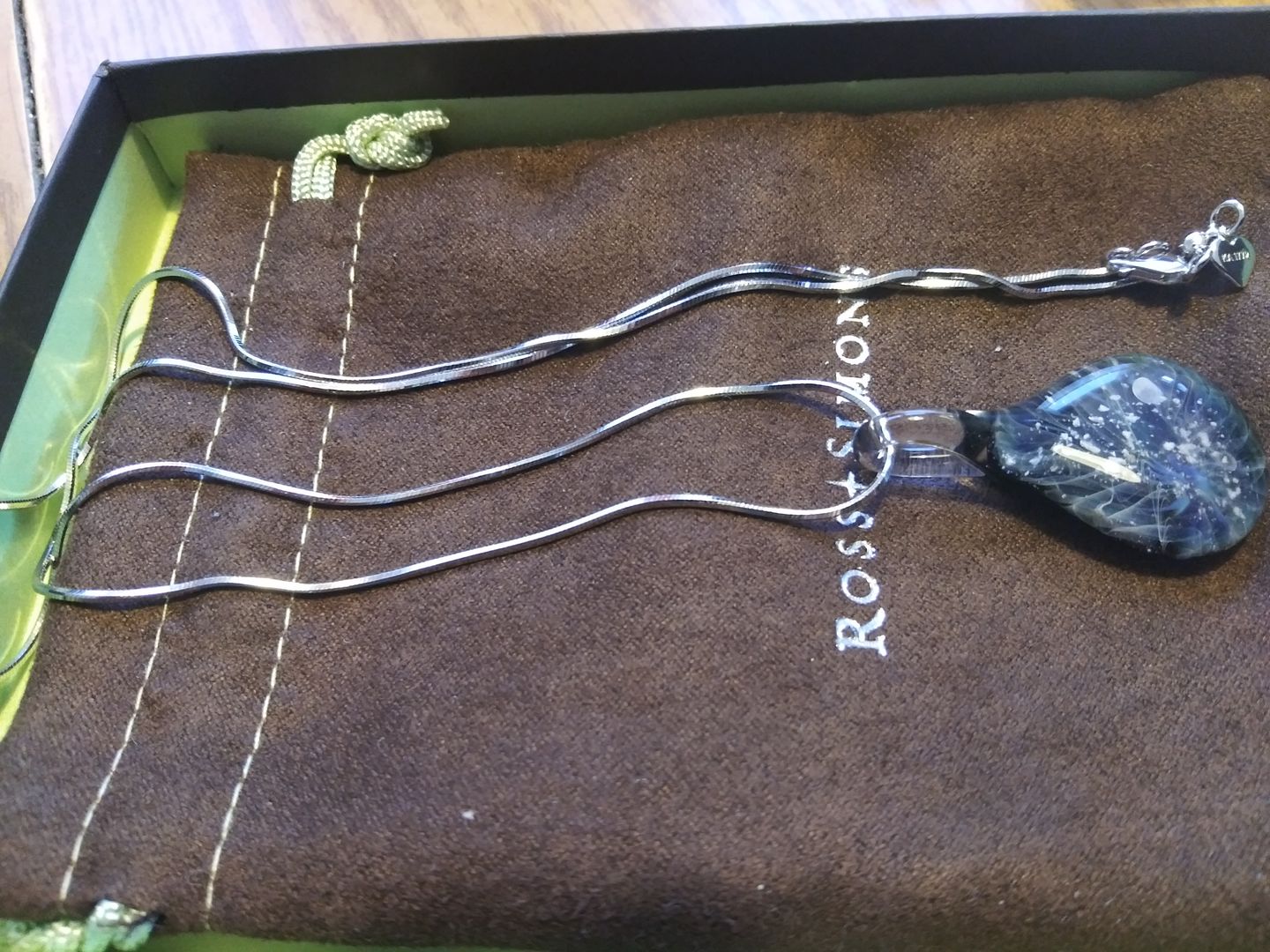 Customer photo review of Ghost Pendant with Infused Cremation Ashes