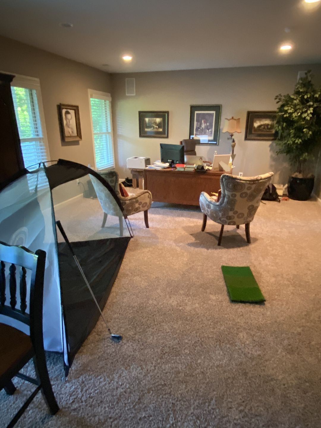 Customer photo review of Golf Practice Driving Net for Indoors and Outdoors | Tri-Turf Hitting Mat