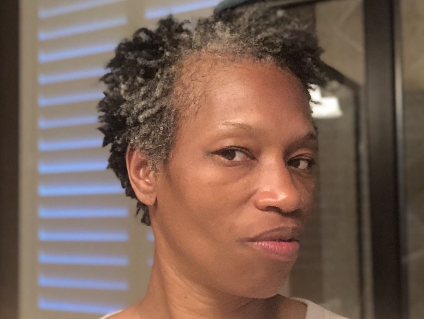Customer photo review of Hair Growth Serum for Curly Hair with Organic Jojoba Oil for Moisturizing and Lavender Fragrance