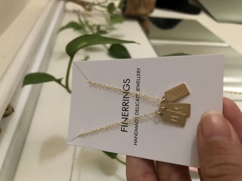 Customer photo review of Tiny Square Initial Stamped Necklace