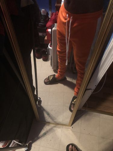 Customer photo review of Outside Solid One Stripe Track Pants Orange - White (100-402)