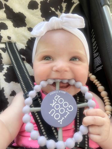 Customer photo review of You Look Good Happy Teether