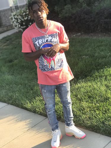 Customer photo review of Trippin Smile Animal Print Tee Coral (21151)