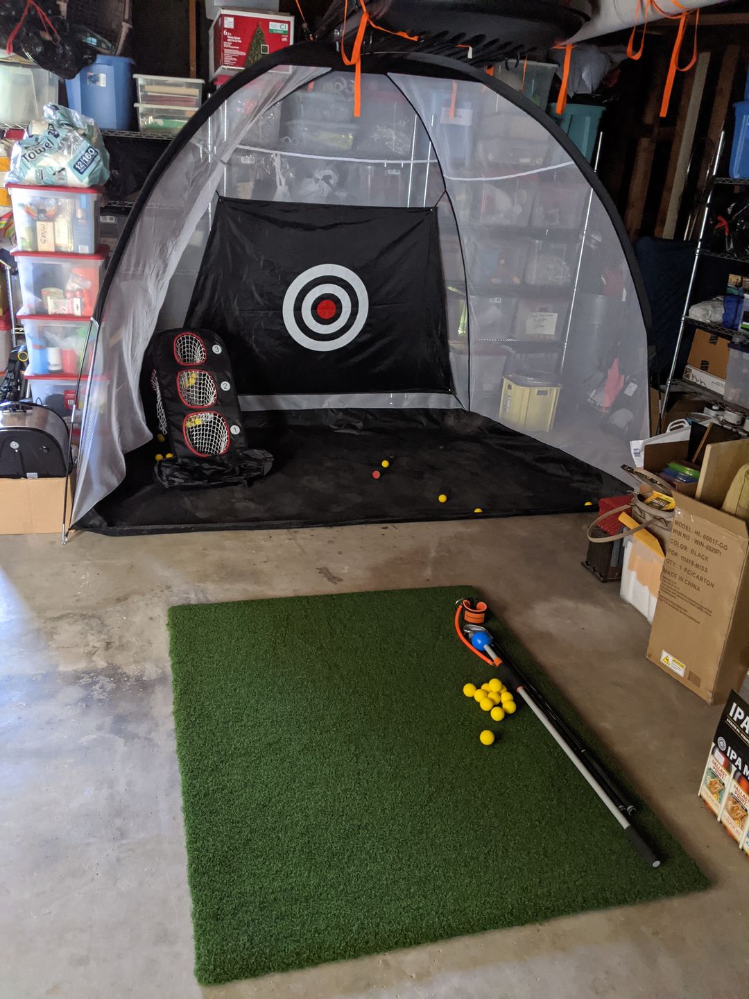 Customer photo review of Golf Practice Driving Net for Indoors and Outdoors | Tri-Turf Hitting Mat