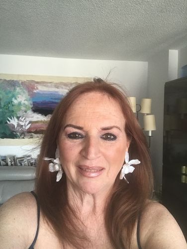 Customer photo review of CRYSTAL LILY EARRINGS