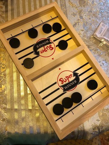 Customer photo review of Sling Puck - Fast Table Hockey Game