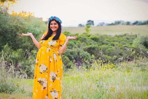 Customer photo review of Hello Yellow Floral Maternity & Nursing Crepe Wrap Dress