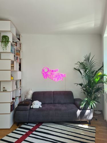 Customer photo review of 'Astronaut Gun' Neon Sign